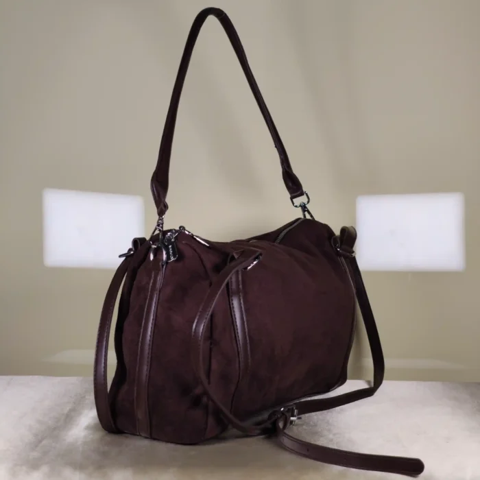 IMG_20260726_005415 Brown suede shoulder and crossbody bag with adjustable strap.