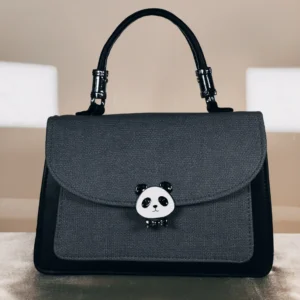 IMG_20260724_142703 Couple tote's Grey textured top handle satchel bag with panda-shaped twist lock, black accents, and detachable crossbody strap