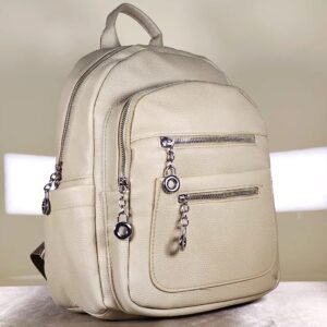 Women's multi-pocket backpack with adjustable shoulder straps, top handle, and multiple zip compartments for everyday use