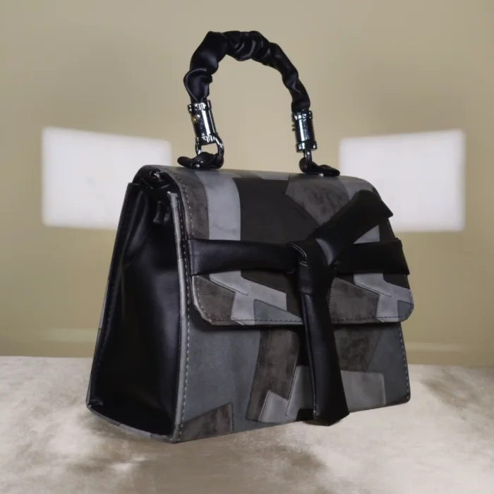 IMG_20260725_224944 Women's geometric patchwork satchel handbag with bow detail, top handle, and detachable shoulder strap