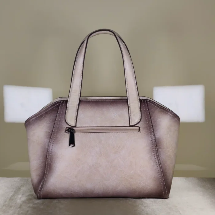 Women's metallic taupe tote handbag with artistic elephant design and detachable sling strap