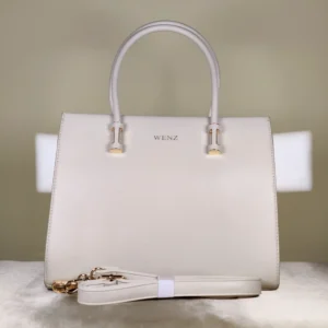 IMG_20260820_125058 Ivory top-handle tote bag with elegant blue floral-inspired print, structured design, and spacious interior for everyday use