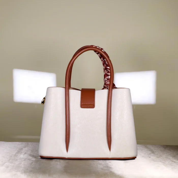IMG_20260820_130744 Christina & Olk women's structured top handle tote bag with scarf accent and detachable shoulder strap.