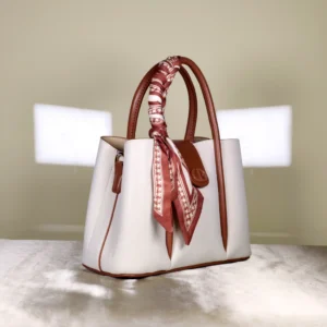 IMG_20260820_130919 Christina & Olk women's structured top handle tote bag with scarf accent and detachable shoulder strap.