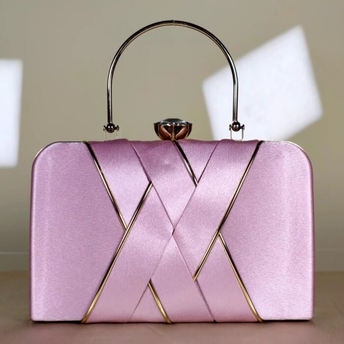 A baby pink Elegant structured clutch bag with top handle
