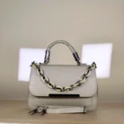 sage green top handle handbag with two-tone chain detail