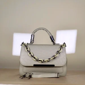 sage green top handle handbag with two-tone chain detail