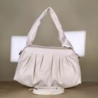White pleated women's shoulder bag with top handle and detachable strap