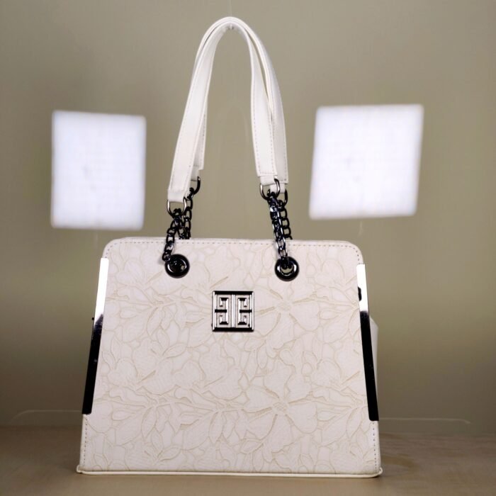 IMG_20260820_165529 Ivory floral embossed top handle bag with black chain handles