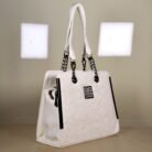 Ivory floral embossed top handle bag with black chain handles