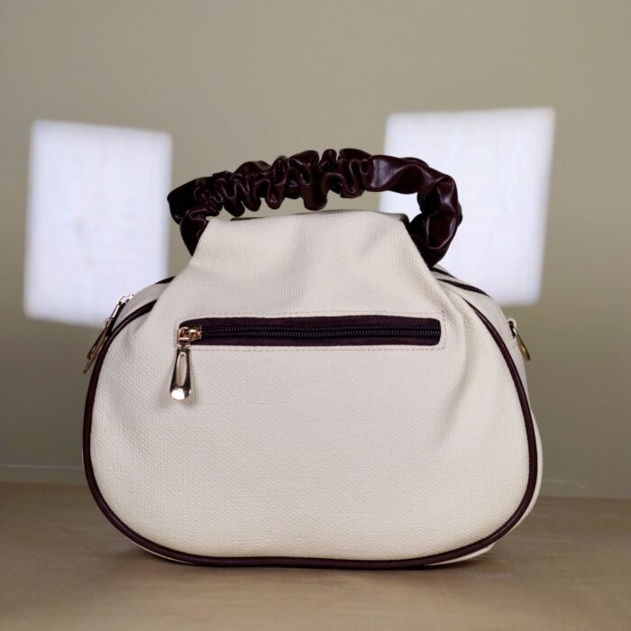 IMG_20260820_165824 Ivory shoulder bag with burgundy bow detail and ruched handle