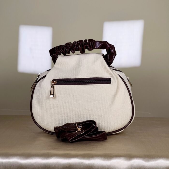 IMG_20260820_165955 Ivory shoulder bag with burgundy bow detail and ruched handle