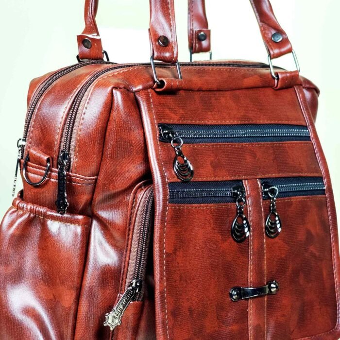 IMG_20260820_2118355 Brown women’s convertible backpack and shoulder bag with multiple zip pockets