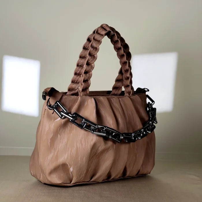 quilted top handle bag with braided handles and silver chain detailing