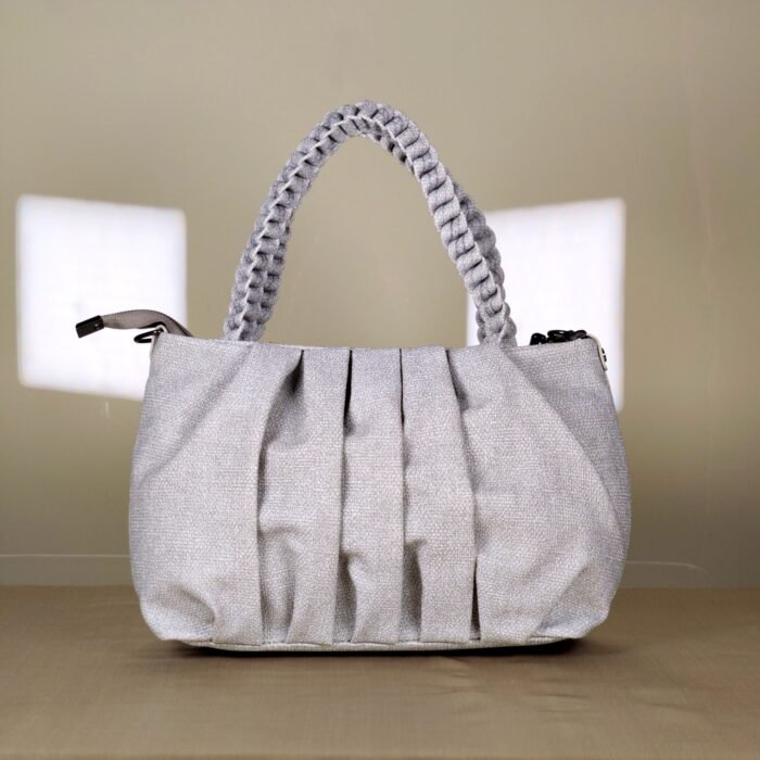 pleated women’s shoulder bag with braided handle and chain detail