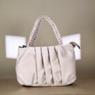 pleated women’s shoulder bag with braided handle and chain detail