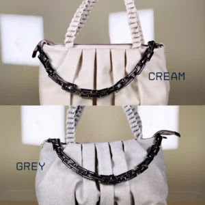 pleated women’s shoulder bag with braided handle and chain detail