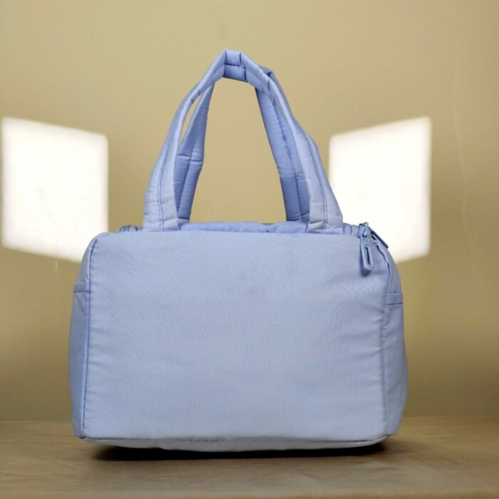 IMG_20260820_231241 Quilted lunch bag with dual handles and zip closure